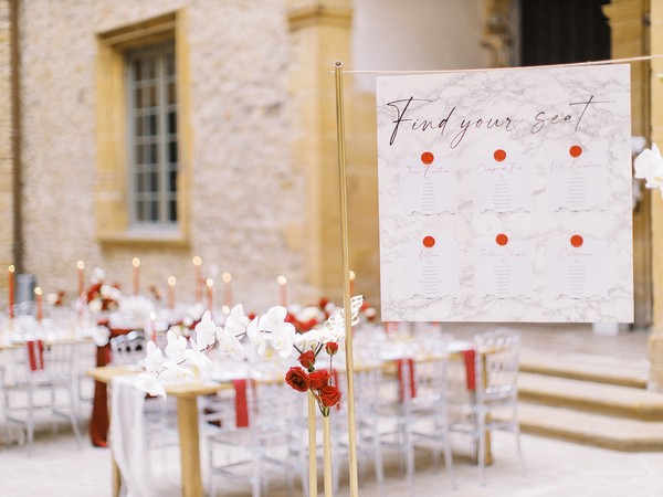 Outdoor wedding reception with white and red