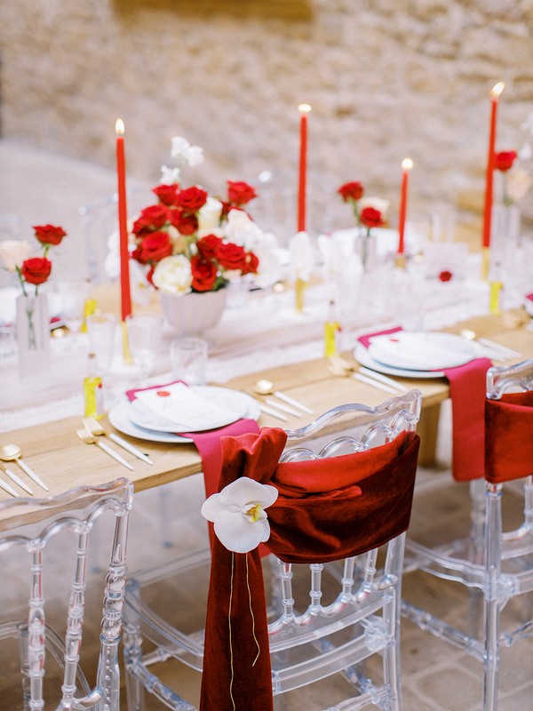 Red outdoor tablescape for wedding