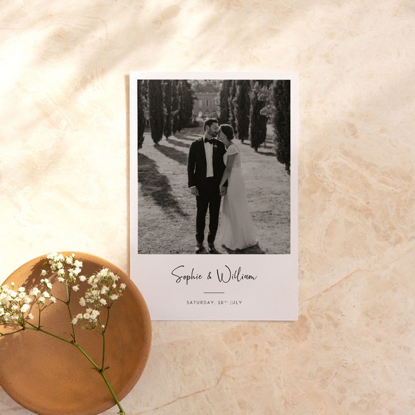 black and white image of bride and groom on wedding stationery