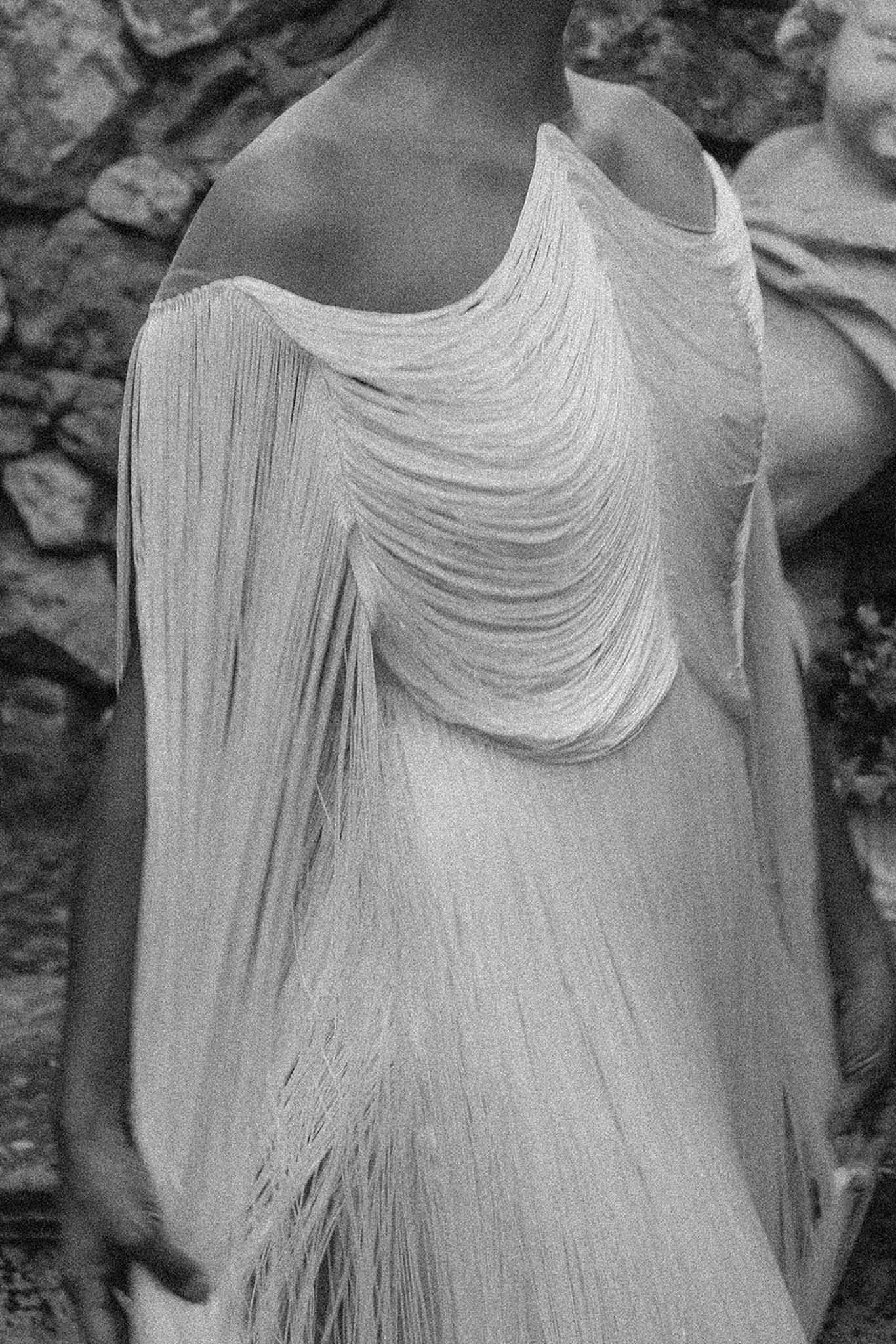 Exterior view of ChÃ¢teau Saint-Victor La Coste stone building and surrounding grounds in summer