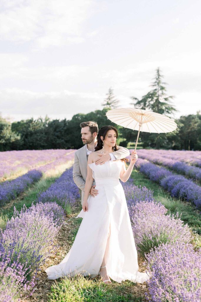 Lavander Fields A.Lucas couple shot bride holding white umbrella