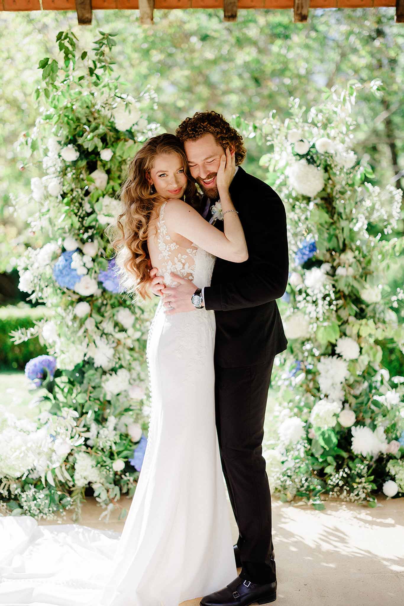 Close-up portrait of bride and groom faces together at Chateau Trieux photographed by M Mann