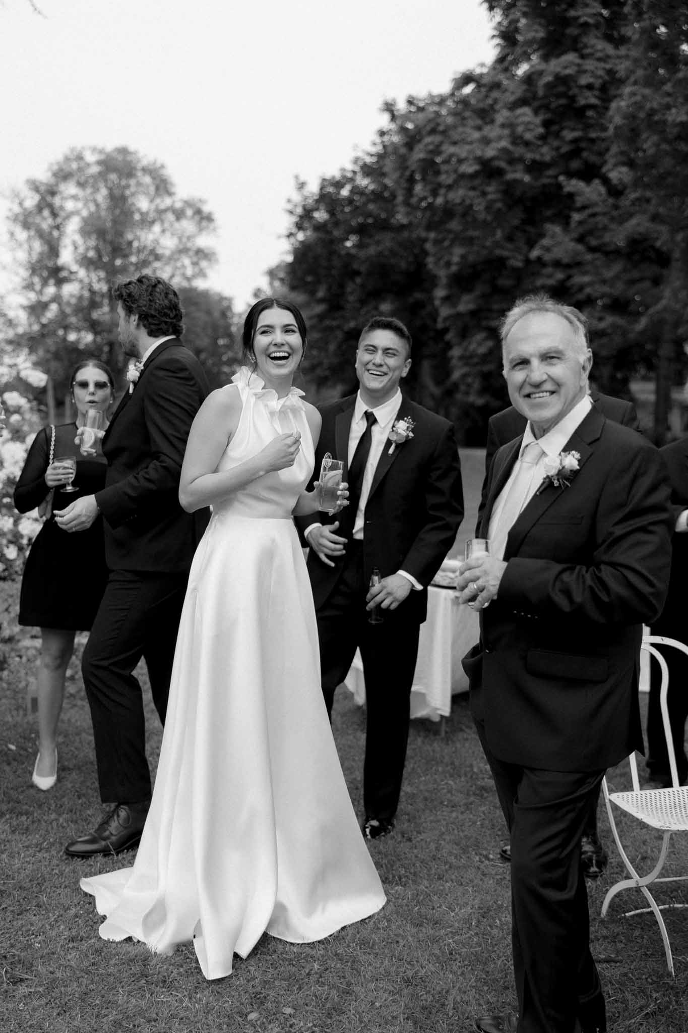Black and white bride and groom in a garden setting