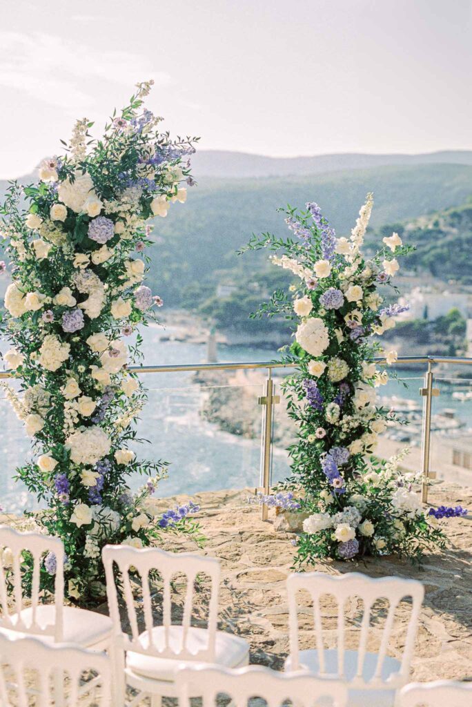 Chateau Cassis Olya two flower tower ceremony altar overlooking ocean
