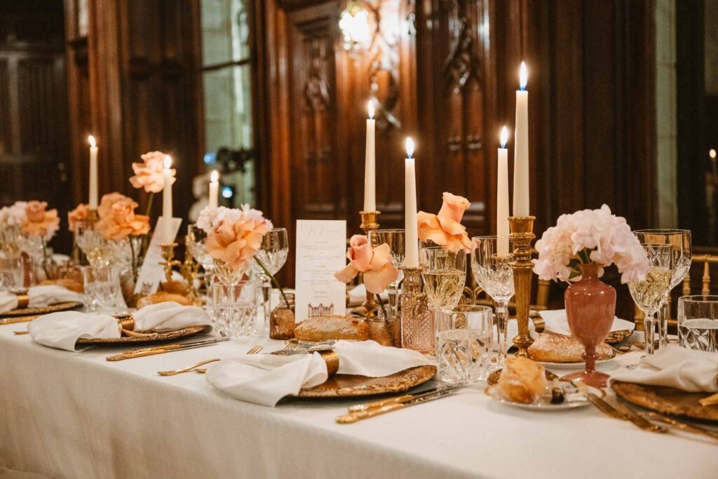Chateau Challain F.Bandiera detail shot reception table candles flowers gold spoon fork
