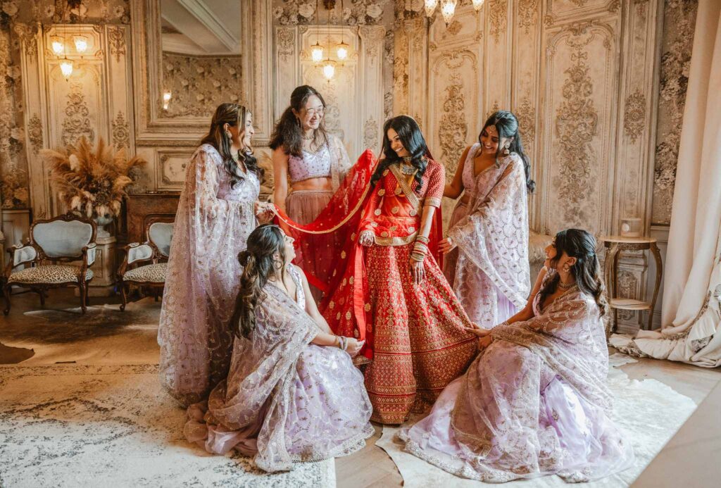 Chateau Challain F.Bandiera indian bride red dress lehenga bridesmaids candid shot vintage room