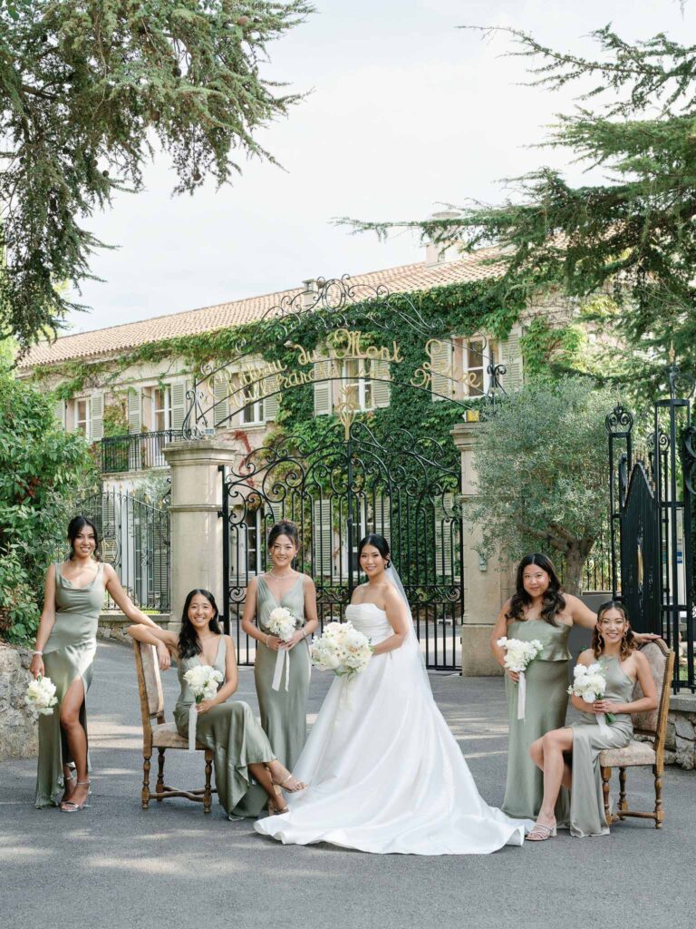 Domaine Mont Leuze CC Weddings bride bridesmaids formal shot outside vinatge gate