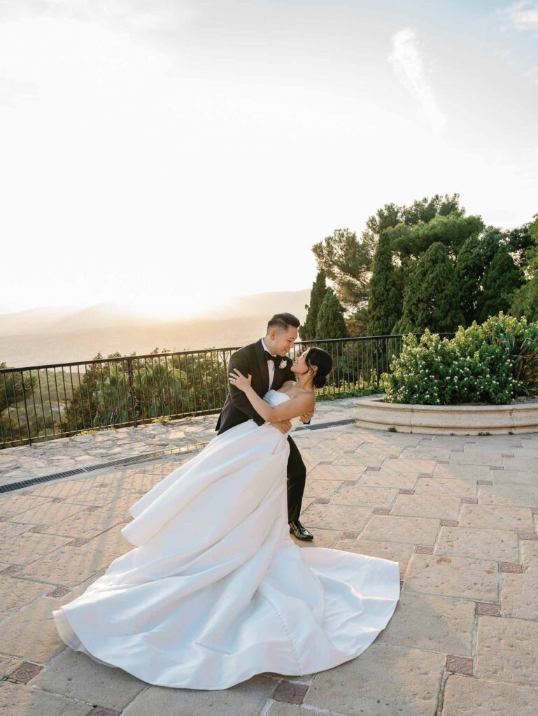 Domaine Mont Leuze CC Weddings bride groom dip hug overlooking view