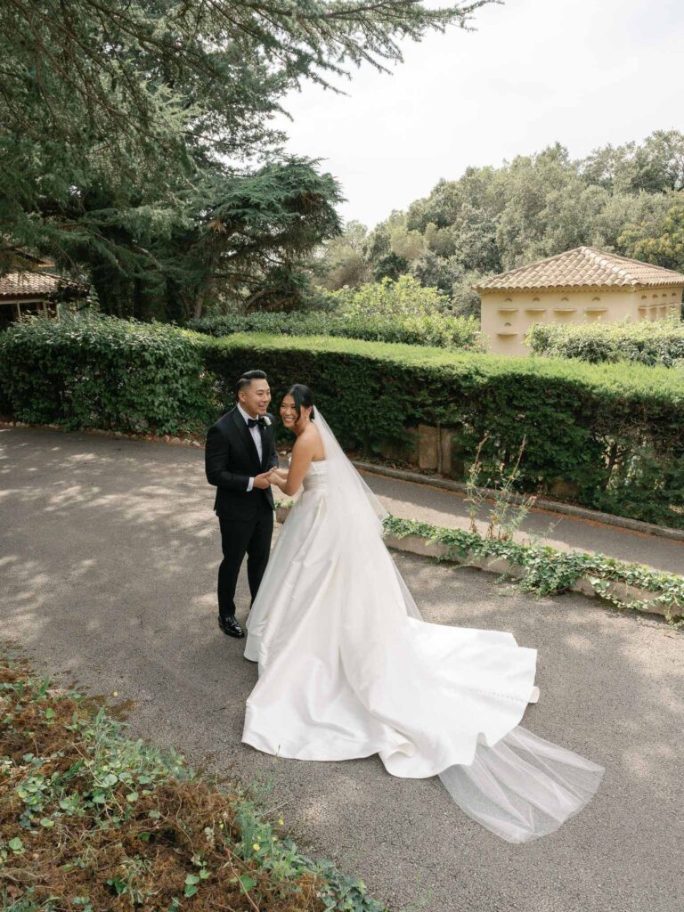 Domaine Mont Leuze CC Weddings bride groom holding hands first look long trail dress veil
