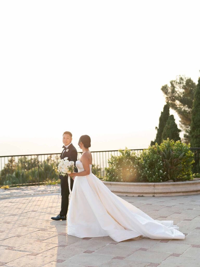 Domaine Mont Leuze CC Weddings bride groom holding hands overlooking view sunset