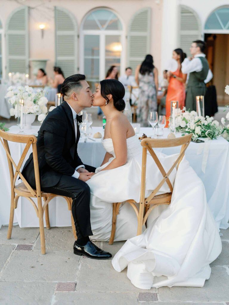 Domaine Mont Leuze CC Weddings bride groom kissing sitting reception