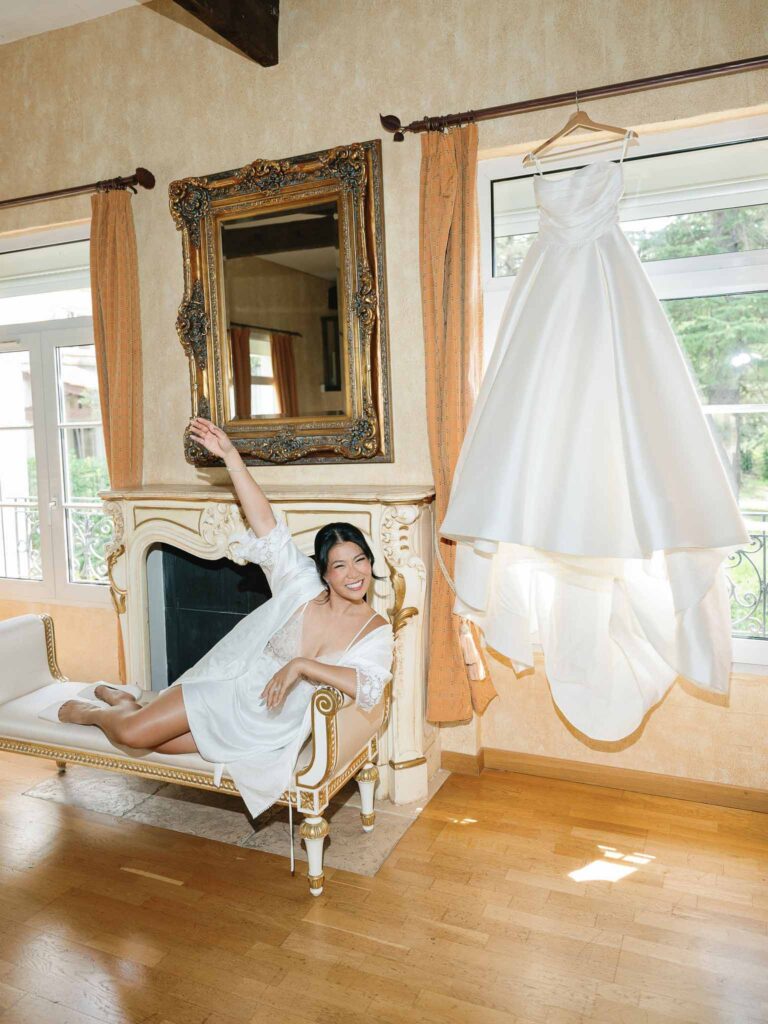 Domaine Mont Leuze CC Weddings bride sitting vintage cleopatra chair dress hanging
