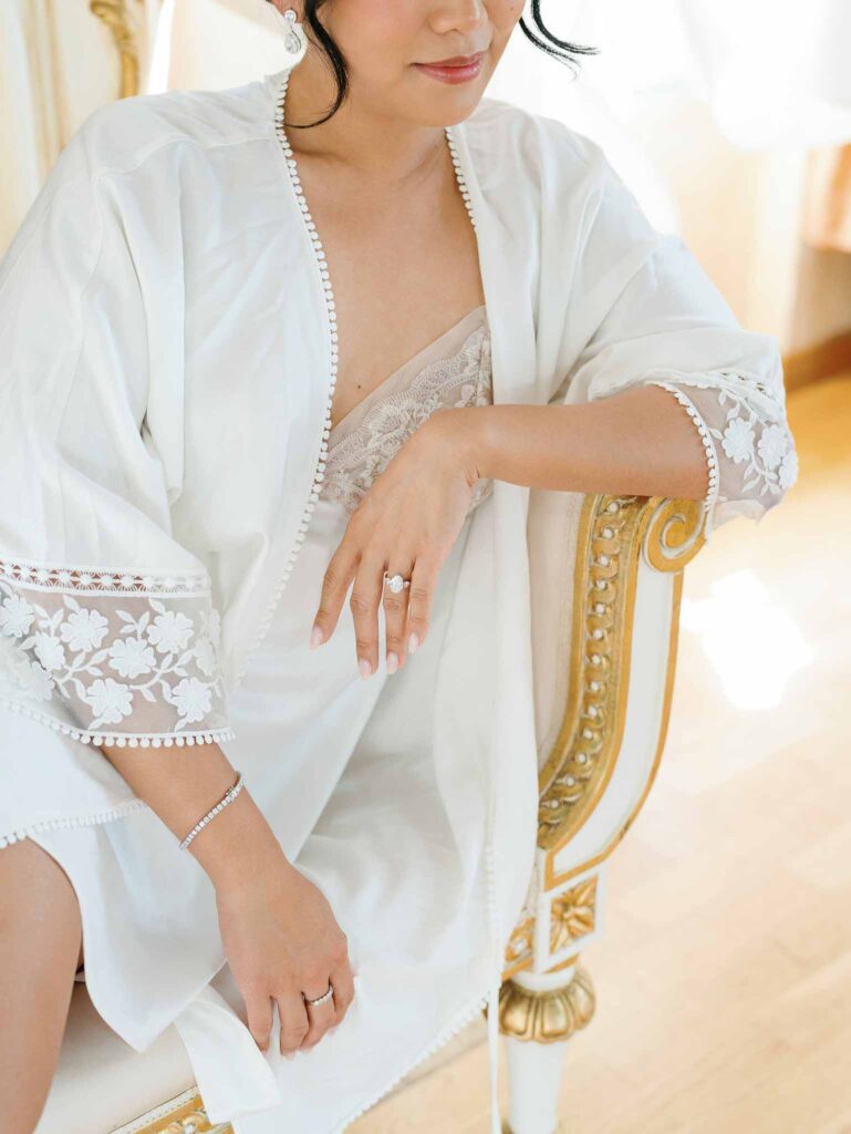 Domaine Mont Leuze CC Weddings detail shot bride lace white robe diamond engagement ring