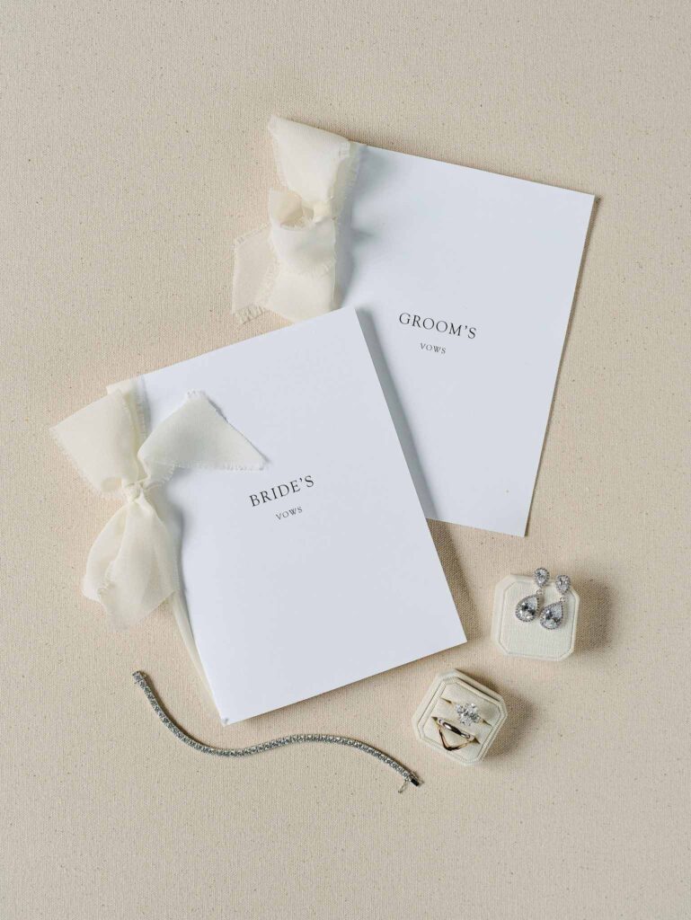 Domaine Mont Leuze CC Weddings flatlay bride groom vow card accessories