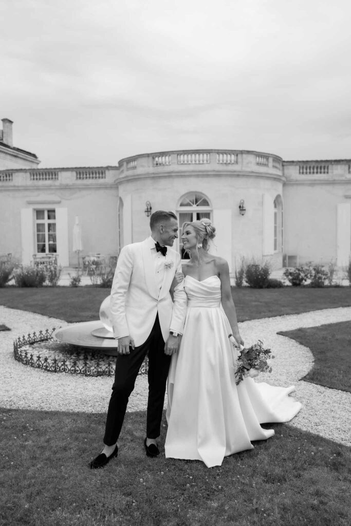 Gassies J.Flood bride leaning shoulder groom garde black white photo