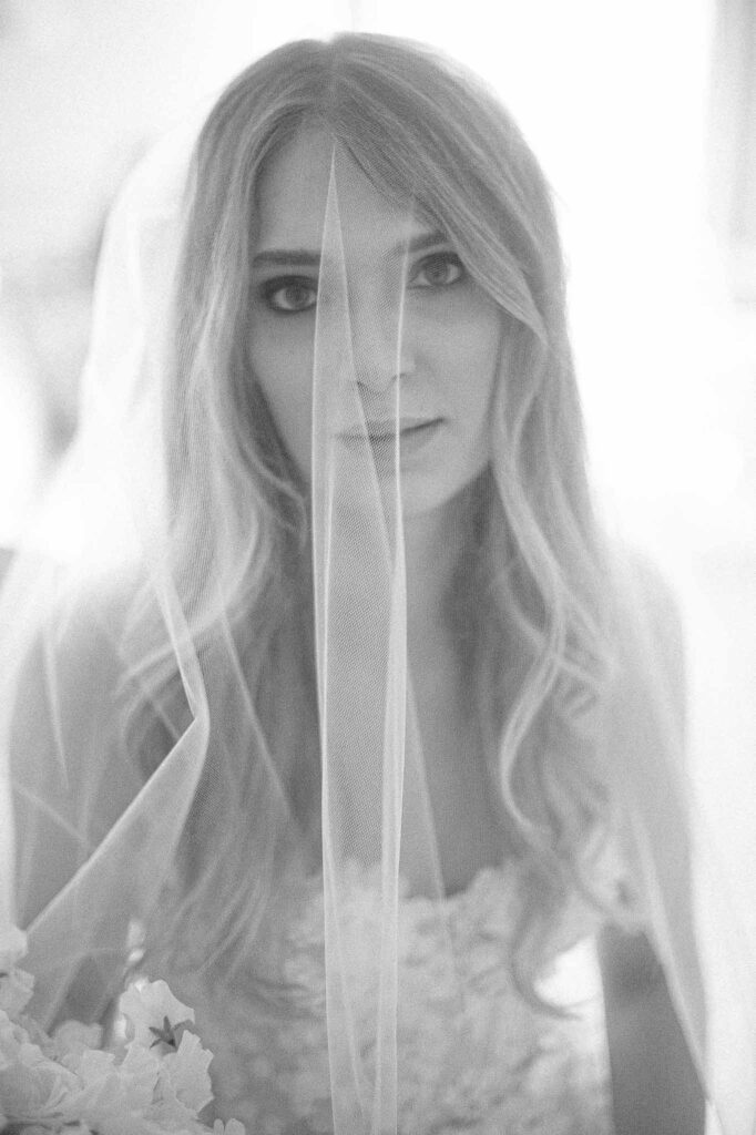Villa Ehprussi Tatyana bride close up shot wavy hair veil smoky eyes
