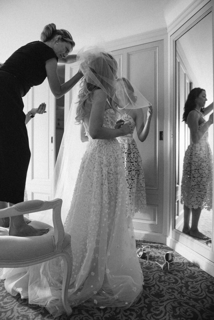 Villa Ehprussi Tatyana bride getting ready lace floral dress putting veil black white photo