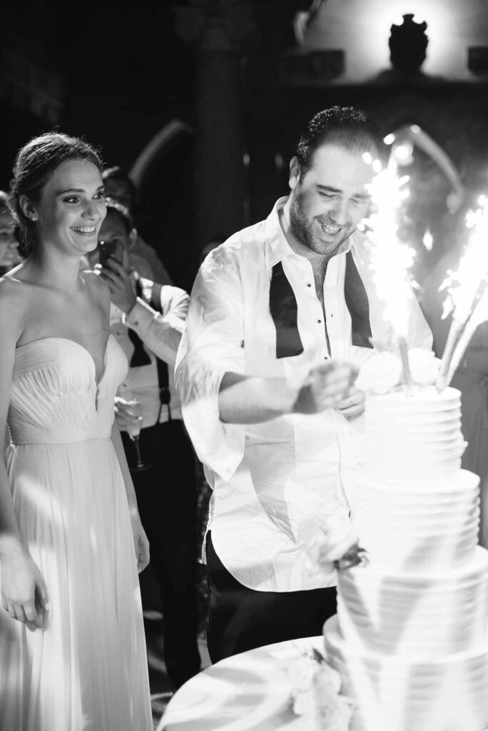 Villa Ehprussi Tatyana bride groom cutting cake reception black white photo