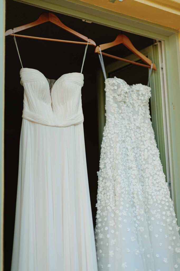 Villa Ehprussi Tatyana bride two strapless dress hanging by door detail shot