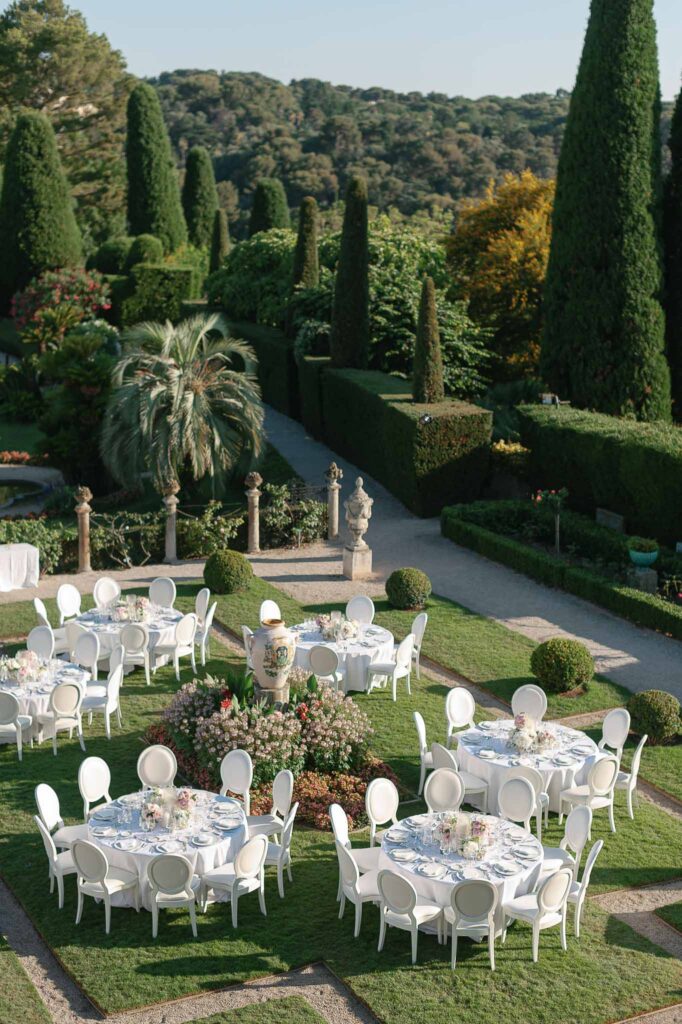 Villa Ehprussi Tatyana detail shot reception area round white tables garden