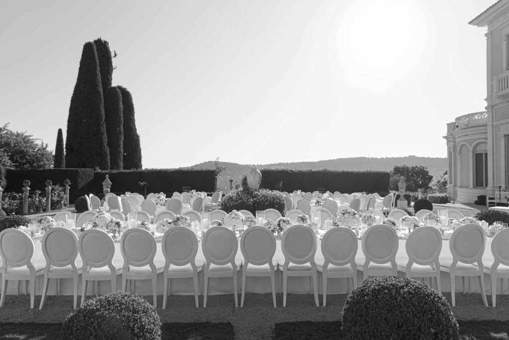 Villa Ehprussi Tatyana detail shot round chairs reception proper garden black white photo