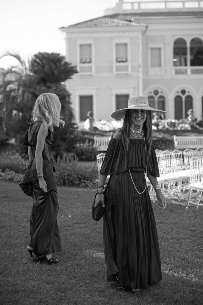 Villa Ehprussi Tatyana guests ceremony area long dresses black white photo