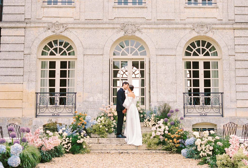 wedding ceremony in front of chateau d'herbertot normandy