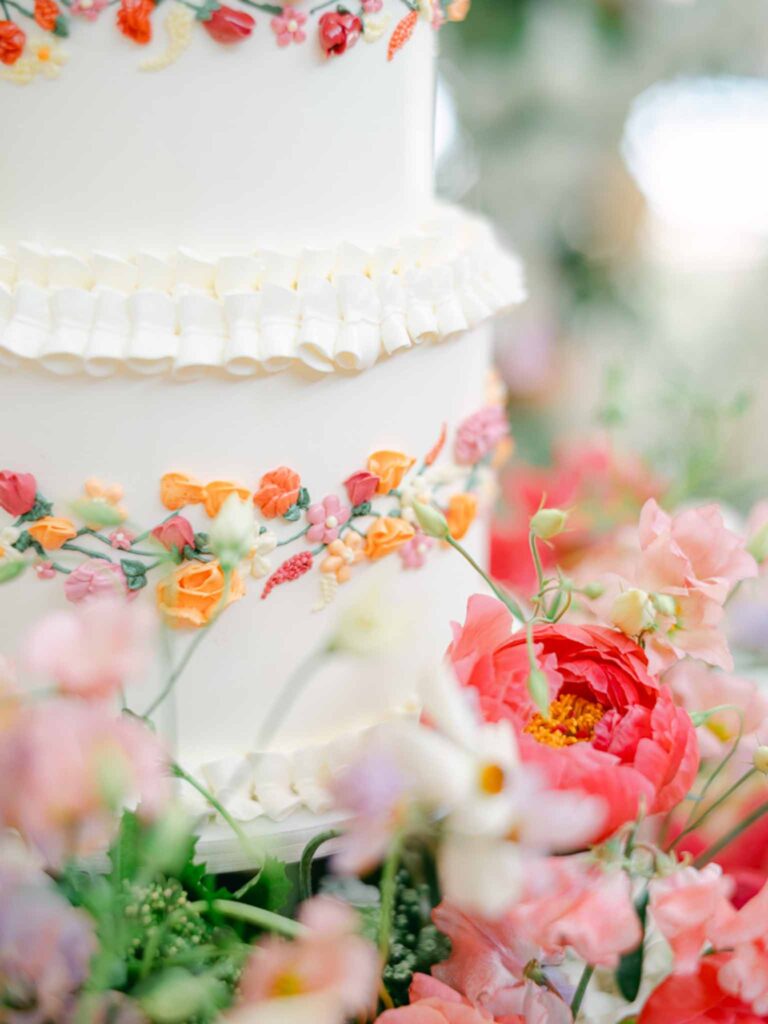 Château Belle Epoque Adeline Murzeau detail shot cake colorful floral decor