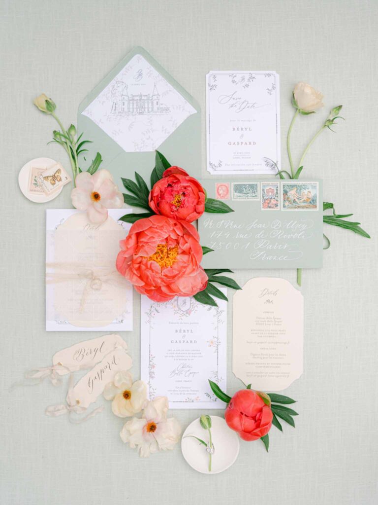 Château Belle Epoque Adeline Murzeau flatlay invitation tropical decor flowers
