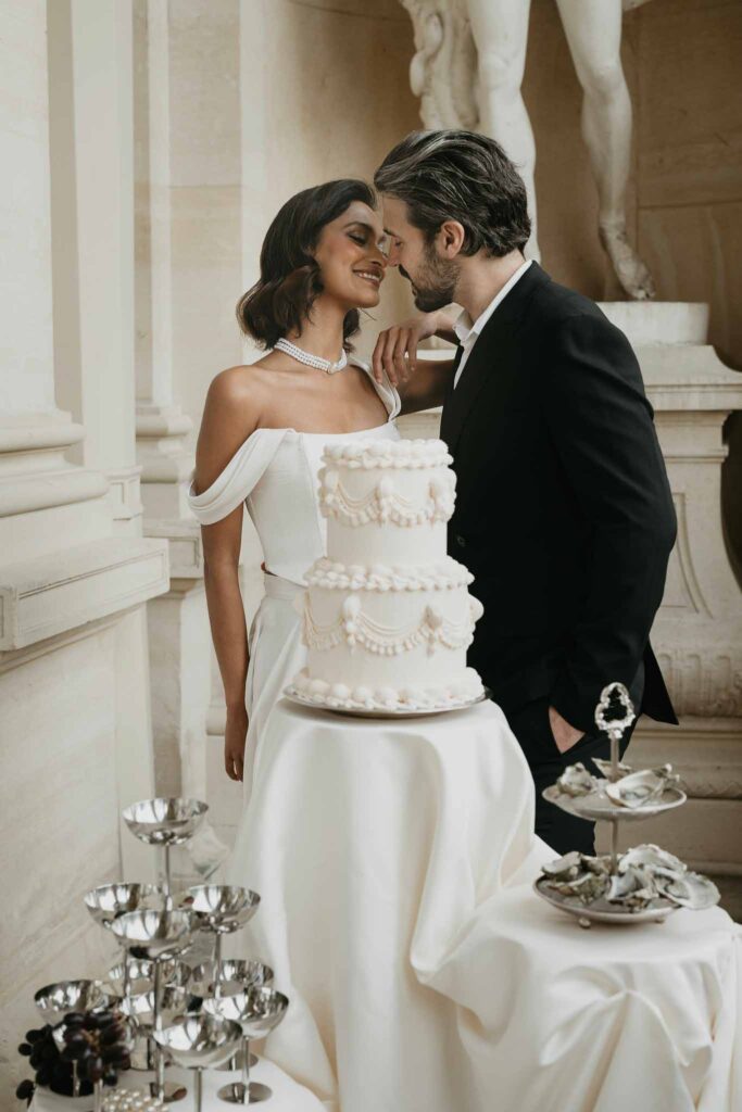 Chateau de Ferrieres Avecamour bride groom kissing cake champagne glass tower oysters