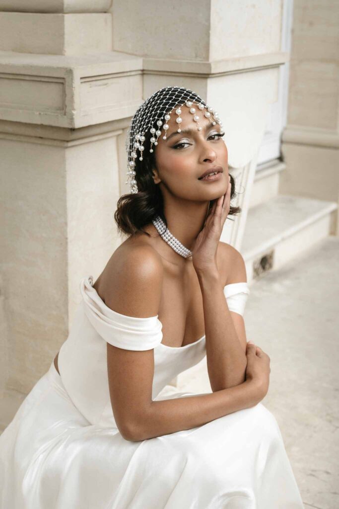 Chateau de Ferrieres Avecamour bride pearl vintage head dress off shoulder dress sitting