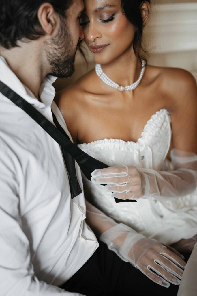 Chateau de Ferrieres Avecamour bride sheer gloves pearl vintage necklace face close groom