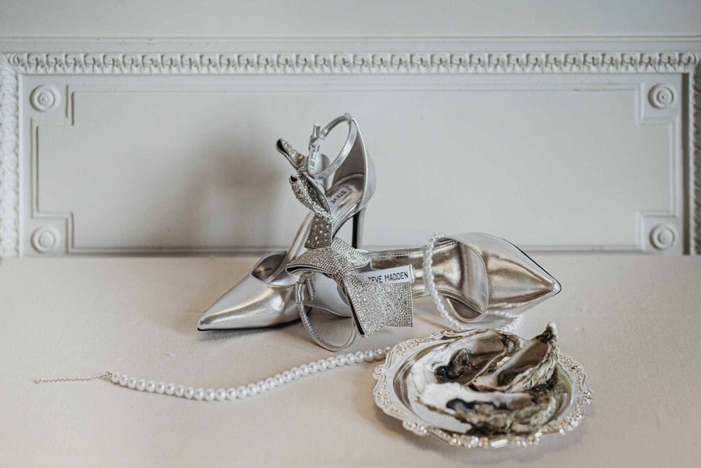Chateau de Ferrieres Avecamour detail shot bride pointed shoes pearl necklace oyster shells