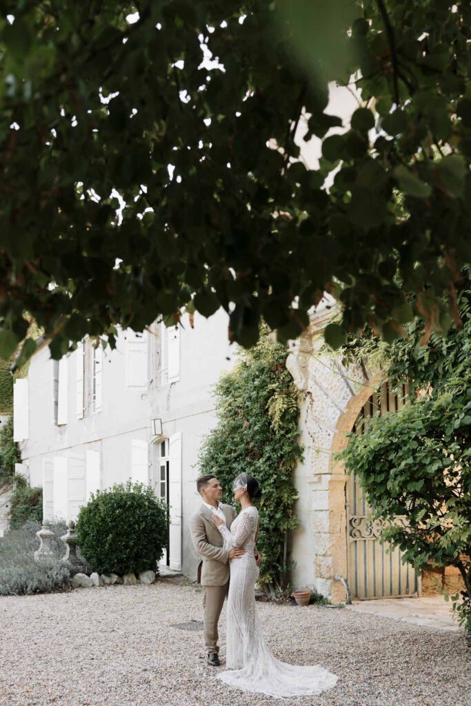 Chateau de Maillac Ala Breskaya bride groom hugging looking each other