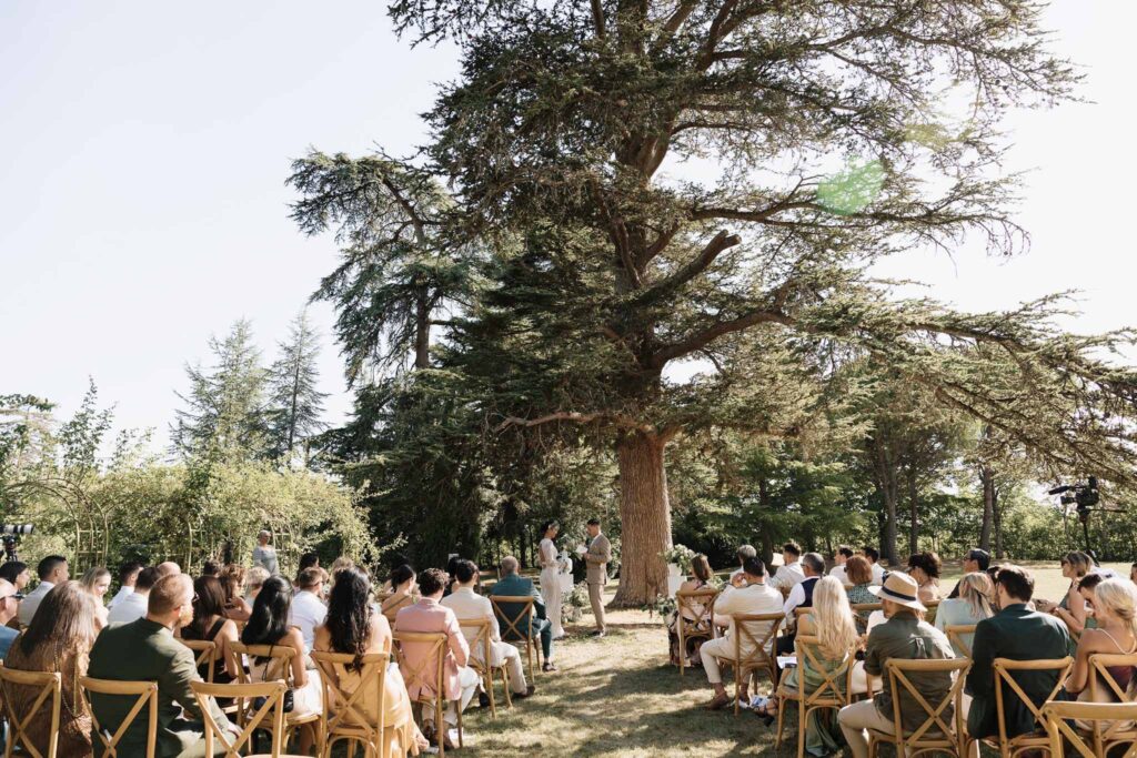 Chateau de Maillac Ala Breskaya bride groom standing ceremony altar guests seated