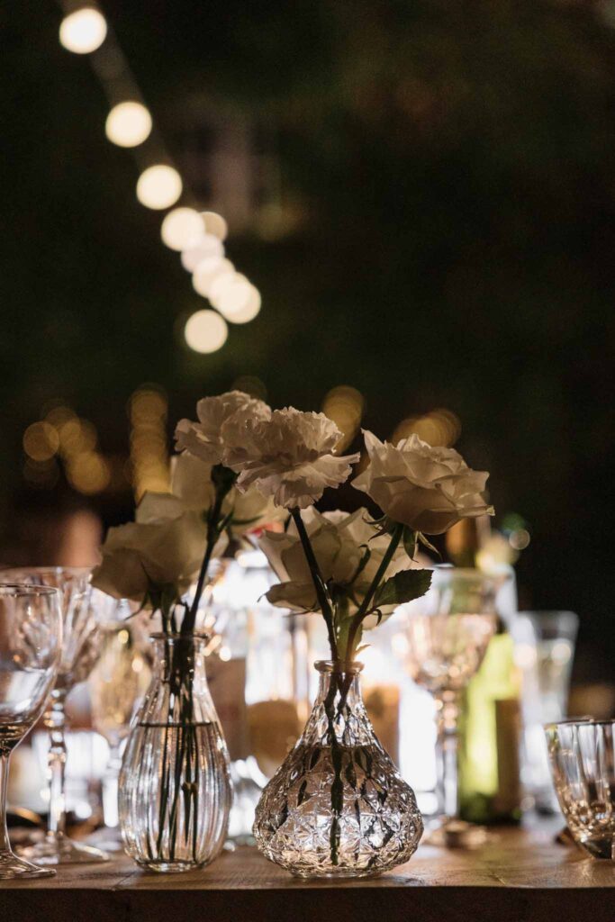 Chateau de Maillac Ala Breskaya detail shot glass vases whiteflower night time