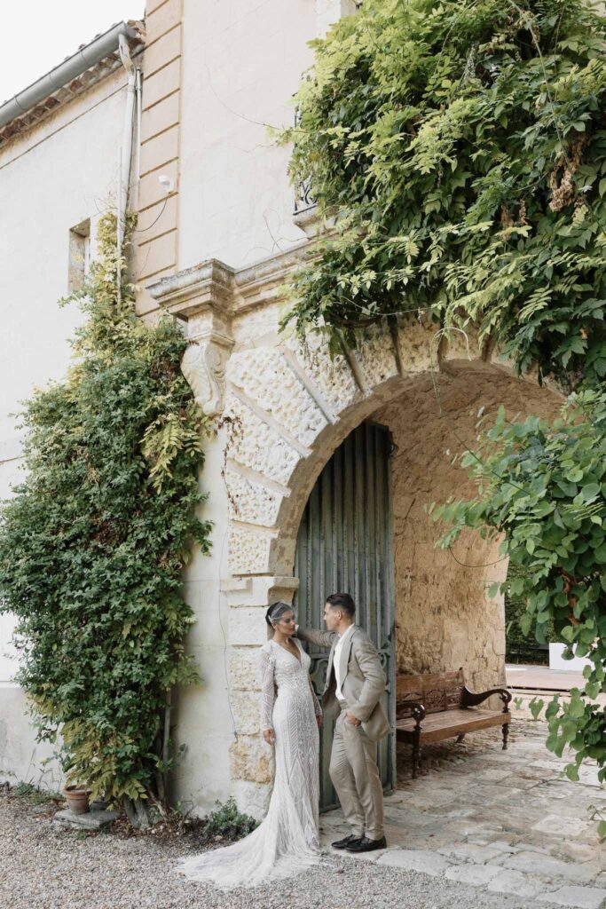 Chateau de Maillac Ala Breskaya groom leaning bride garden area
