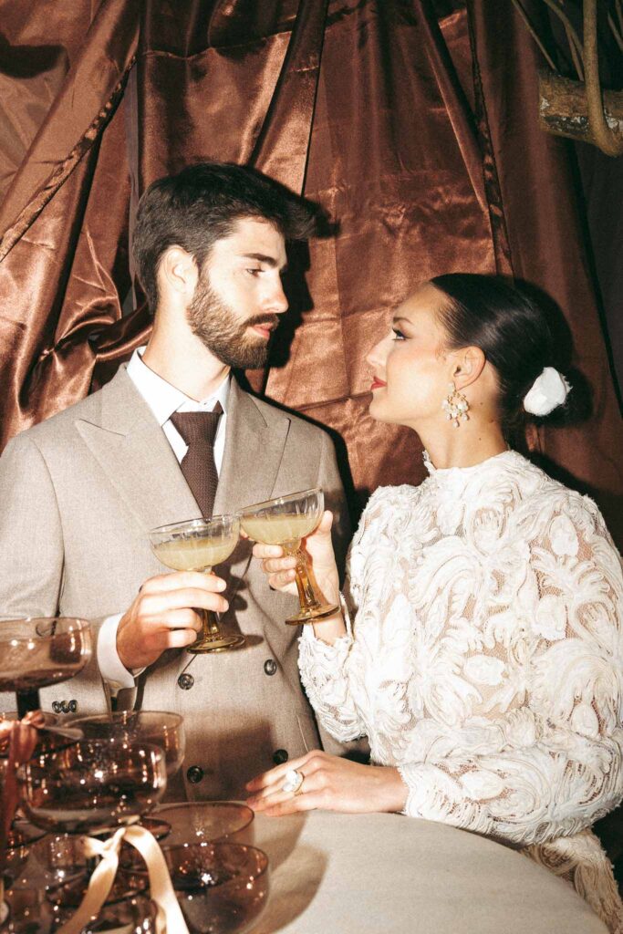 Chateau de la gruerie bride groom looking each other toast champagne glass