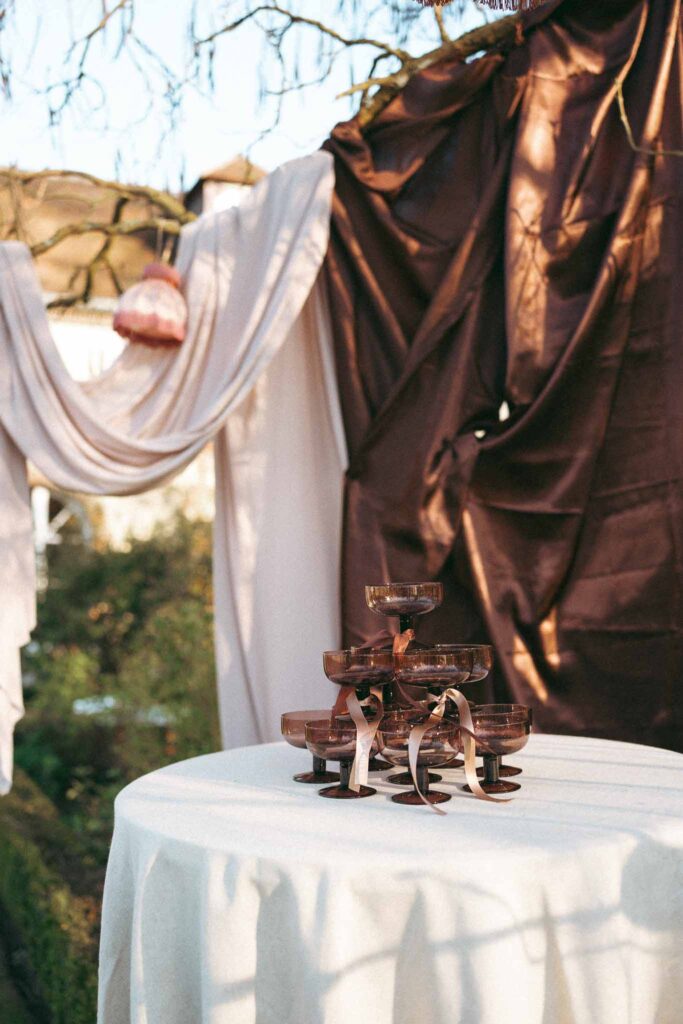 Chateau de la gruerie detail shot champagne glass tower table reception