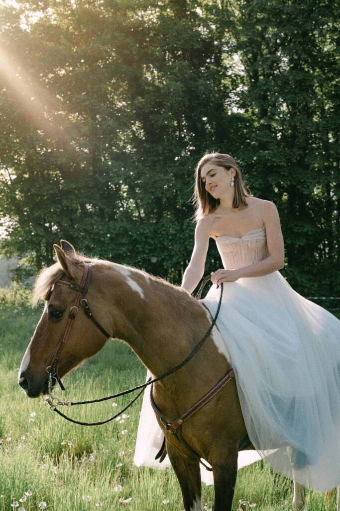 Chateau sainte claire keith flament bride strapless corset tulle dress riding horse sunset