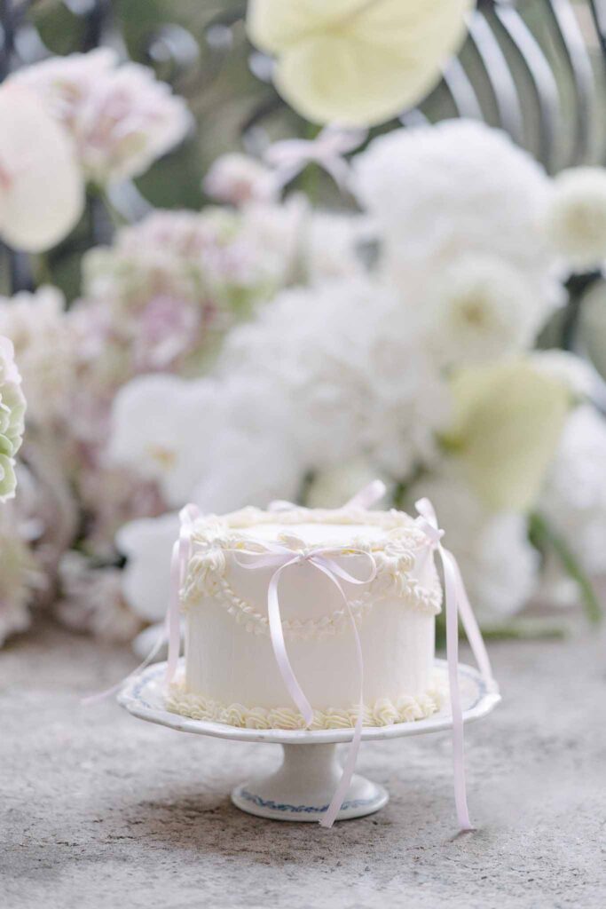 chateau marcellus sasha dove detail shot one tier icing cake ribbon