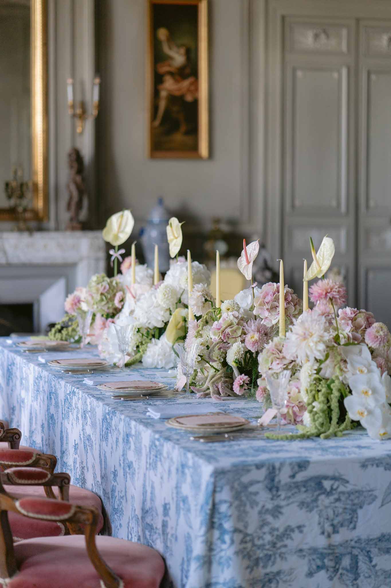 Wedding reception table setting with white roses