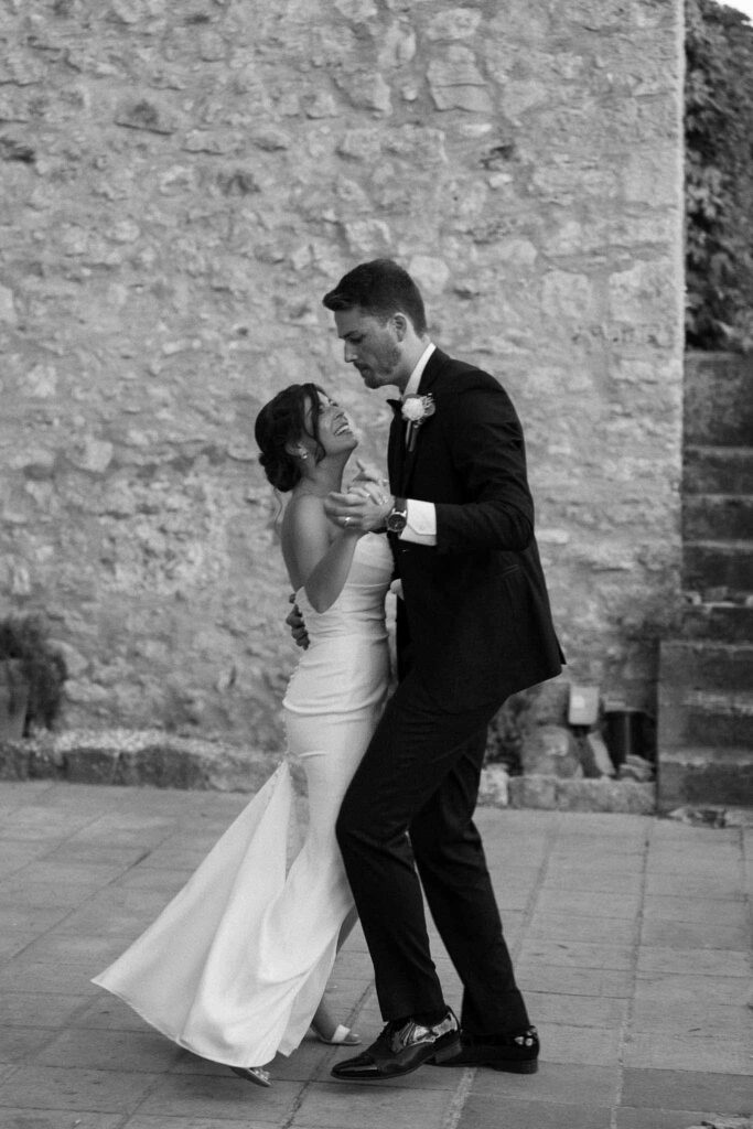 manoir de letang myrto events bride groom dancing black white photo