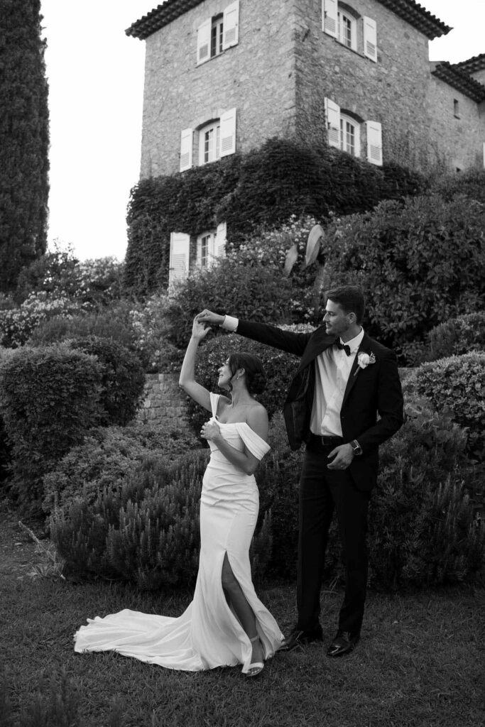 manoir de letang myrto events bride groom dancing twirling garden0venue black white photo