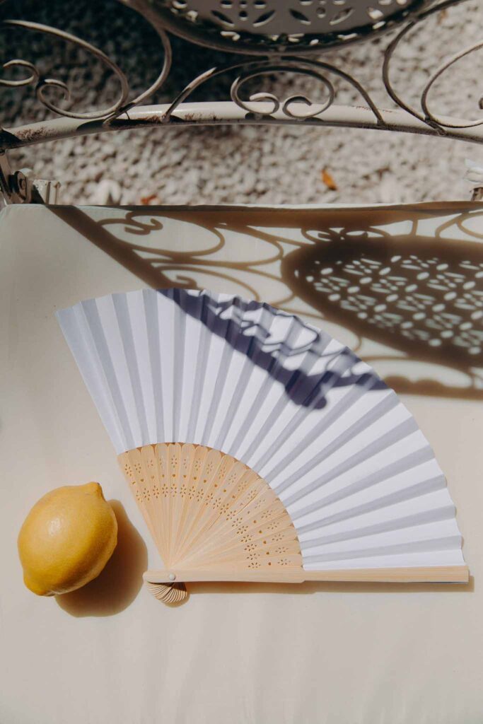 Chateau de Robernier Elise Morgan detail shot white paper fan ceremony