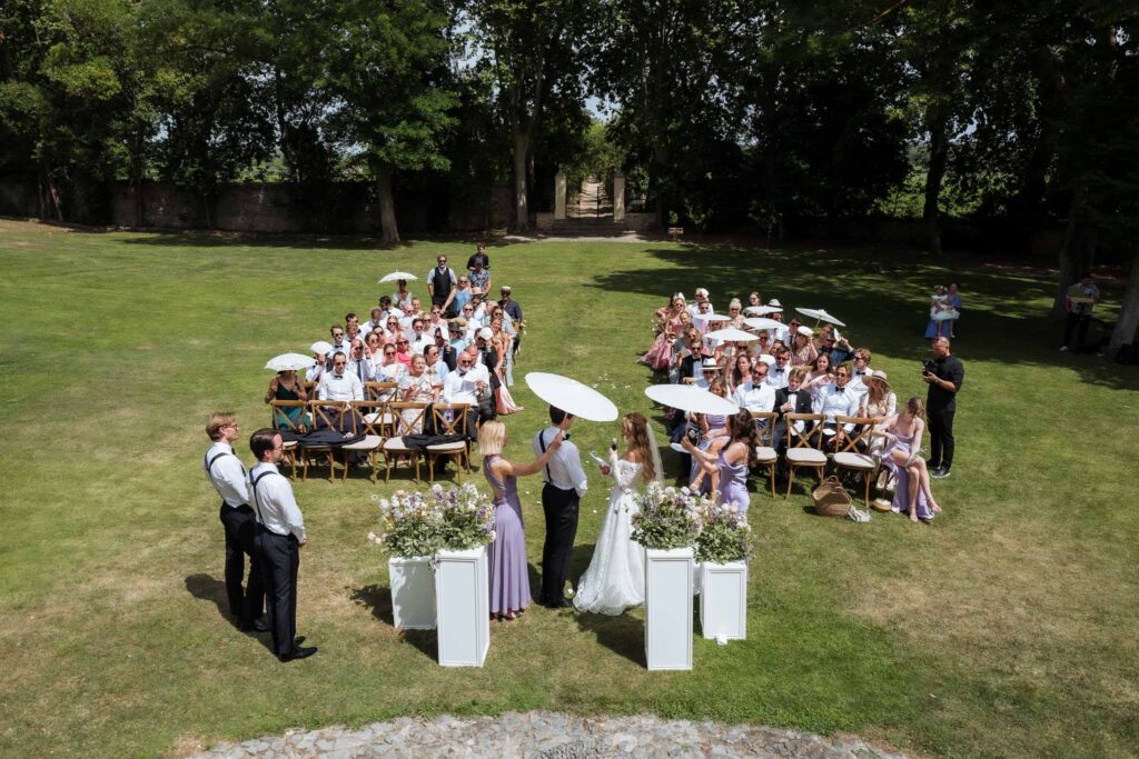 Chateau Saint Cecile Claudia Stylo bride groom guests ceremony wide view shot