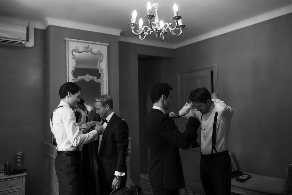 Chateau Saint Cecile Claudia Stylo groom groomsmen get ready put bow tie