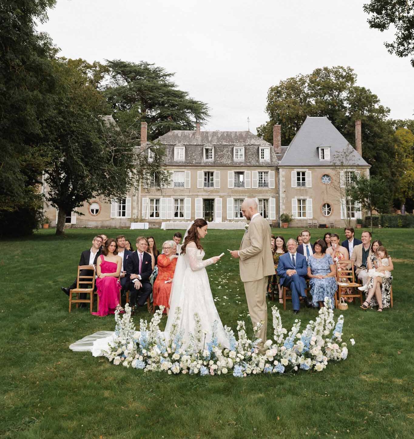 Chateau de Bouthonvillier Paco Aga bride groom exchanging vows altar ceremony guests seated