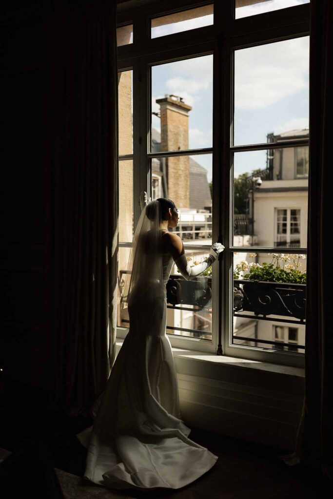 Boat in Paris Joan Jellet bride get ready hotel window long trail dress