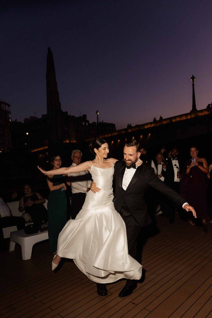 Boat in Paris Joan Jellet bride groom dancing boat deck reception